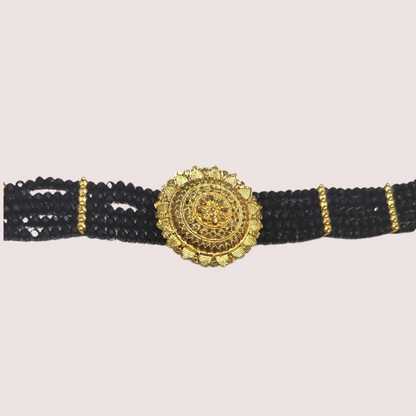 Midnight Majesty Black Beaded Necklace with Ornate Gold Floral Medallion
